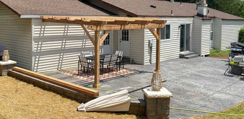 wooden pergola on back patio