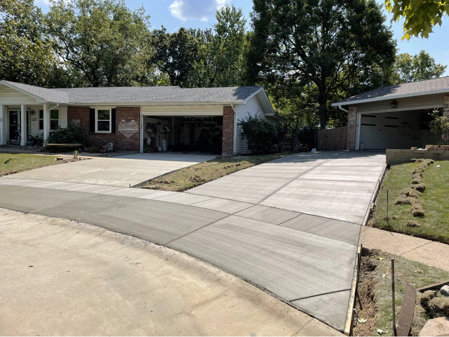outside view of a house with concrete driveway